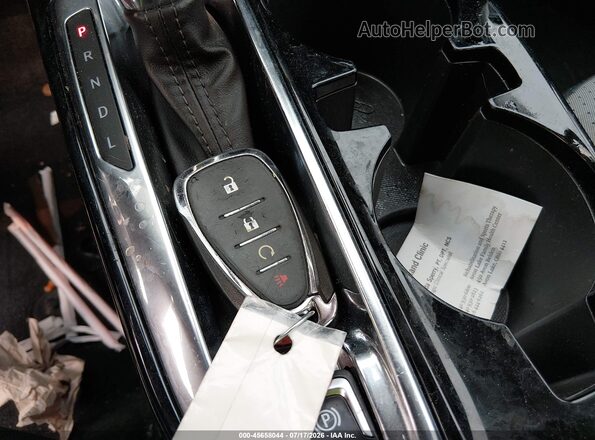 KL77LHE25RC053395 2024 CHEVROLET TRAX Красный Вид панели приборов