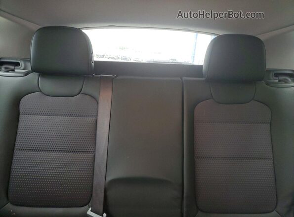 KL77LHE26SC039995 2025 CHEVROLET TRAX Red Widok tylnych siedzeń