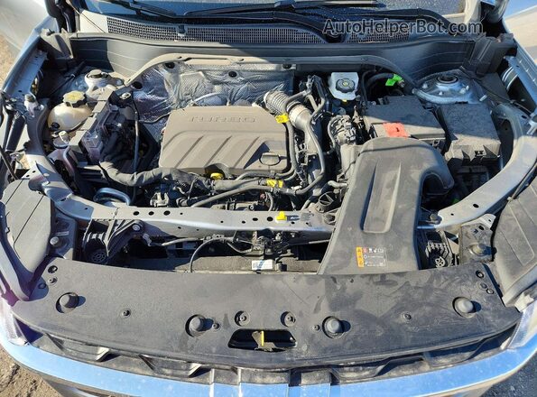 KL77LHE2XRC177758 2024 CHEVROLET TRAX Silver Widok komory silnika