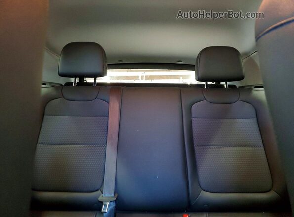 KL77LHEP1TC086798 2026 CHEVROLET TRAX White Vista de los asientos traseros