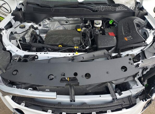 KL77LHEP1TC128516 2026 CHEVROLET TRAX Белый Вид задней части салона