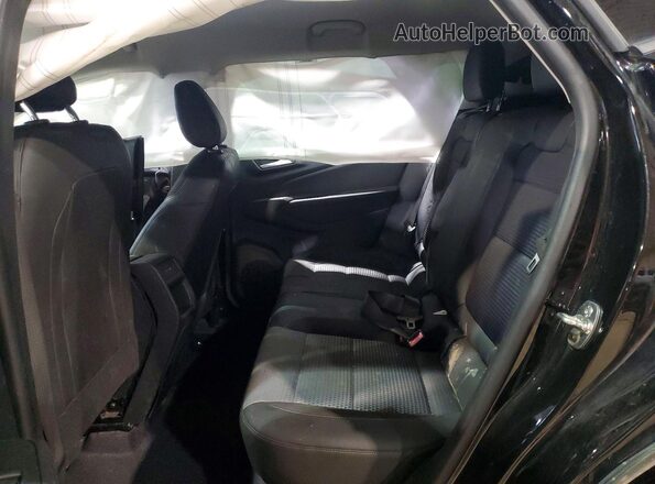 KL77LHEP4SC229161 2025 CHEVROLET TRAX Черный Вид задней части салона