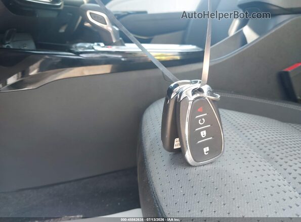 KL77LHEP7SC088795 2025 CHEVROLET TRAX Белый Вид панели приборов