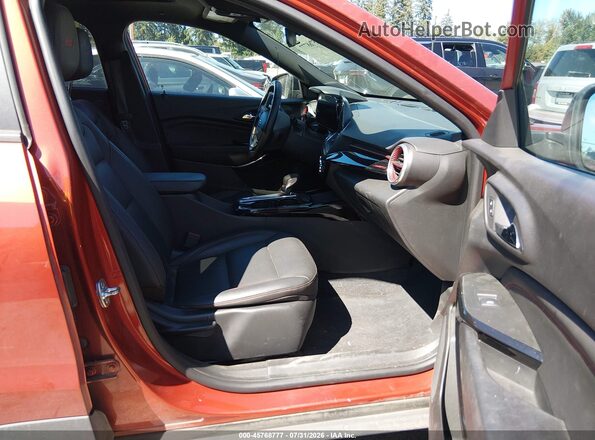 KL77LJE20RC218292 2024 CHEVROLET TRAX Orange Widok wnętrza z przodu