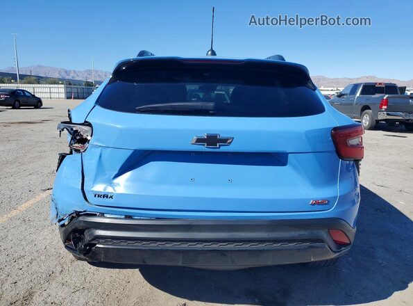 KL77LJE20RC219720 2024 CHEVROLET TRAX Синий Вид сзади