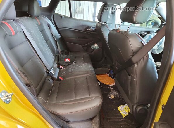 KL77LJEP0SC052308 2025 CHEVROLET TRAX Yellow Rear seats view