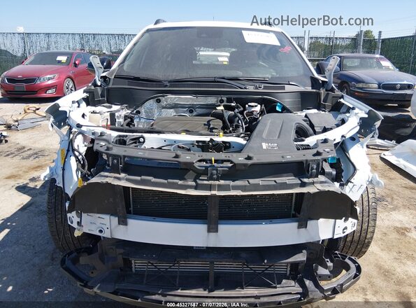 KL77LJEP5SC247515 2025 CHEVROLET TRAX White Rear interior view