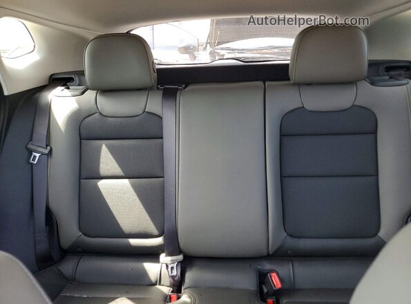 KL77LKE22RC149997 2024 CHEVROLET TRAX Black Rear seats view