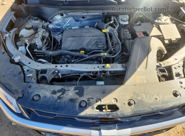 KL77LKE22RC167352 2024 CHEVROLET TRAX Серебряный Вид задней части салона
