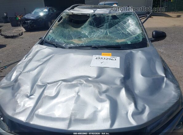 KL77LKEP2SC104446 2025 CHEVROLET TRAX Серый Вид спереди