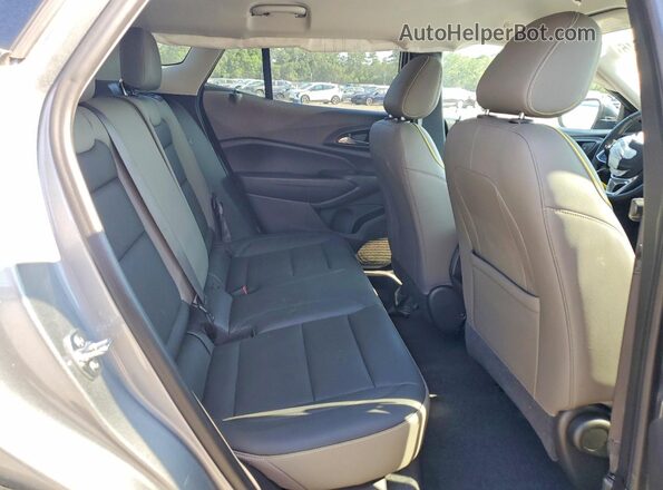 KL77LKEP3SC103547 2025 CHEVROLET TRAX Серебряный Вид задней части салона
