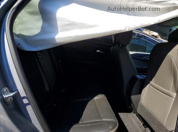 KL77LKEP6SC128247 2025 CHEVROLET TRAX Gray Vista de los asientos traseros