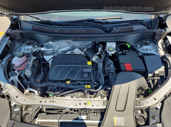 KL77LKEP8TC099223 2026 CHEVROLET TRAX Silver Rear interior view