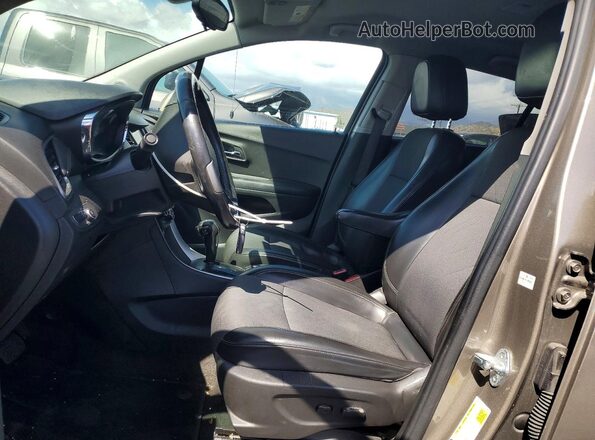 KL7CJLSM0NB512572 2022 CHEVROLET TRAX Tan Vista interior delantera