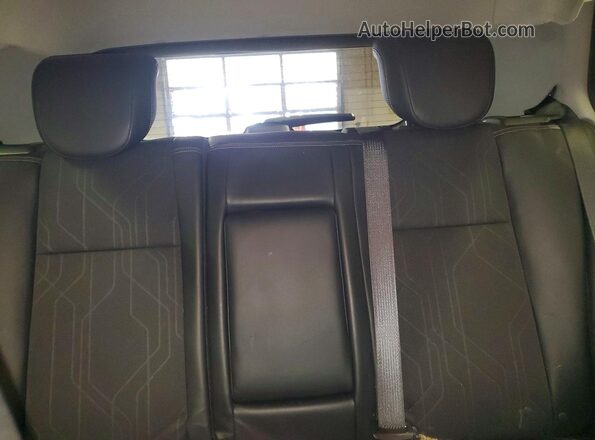 KL7CJPSB5LB058807 2020 CHEVROLET TRAX Black Rear seats view