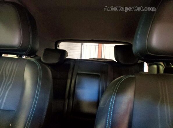 KL7CJPSB7GB617151 2016 CHEVROLET TRAX Orange Vista de los asientos traseros