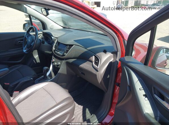 KL7CJPSB8MB357077 2021 CHEVROLET TRAX Red Vista interior delantera