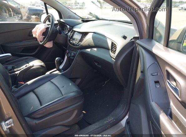 KL7CJPSM2NB502861 2022 CHEVROLET TRAX Бежевый Вид салона спереди