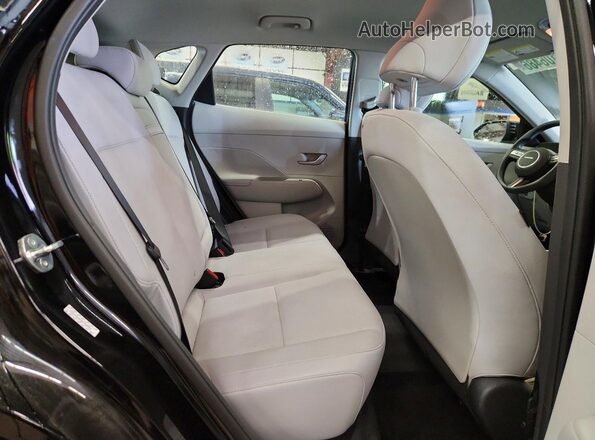 KM8HACAB5RU041453 2024 HYUNDAI KONA Black Vista interior trasera