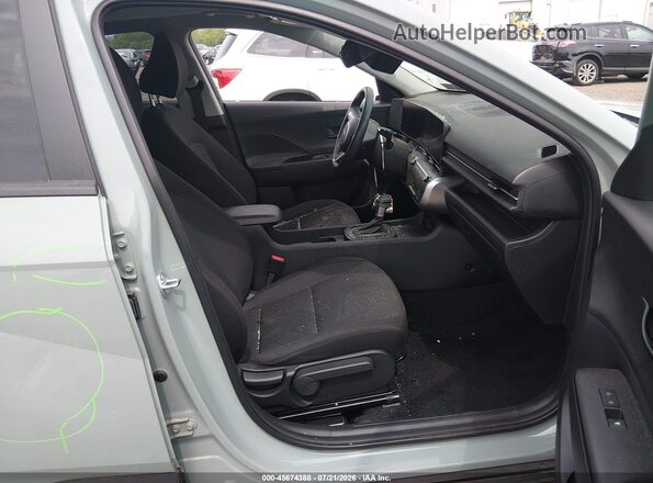 KM8HBCAB6SU263275 2025 HYUNDAI KONA Зеленый Вид салона спереди