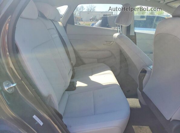 KM8HCCAB1RU103098 2024 HYUNDAI KONA Gray Vista interior trasera