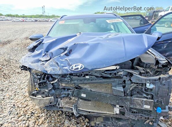 KM8HCCAB9RU094991 2024 HYUNDAI KONA Blue Սալոնի հետևի տեսք