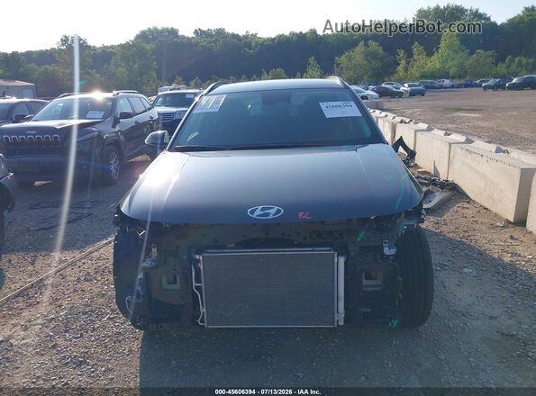 KM8HFCAB6TU382997 2026 HYUNDAI KONA Gray Vista interior trasera