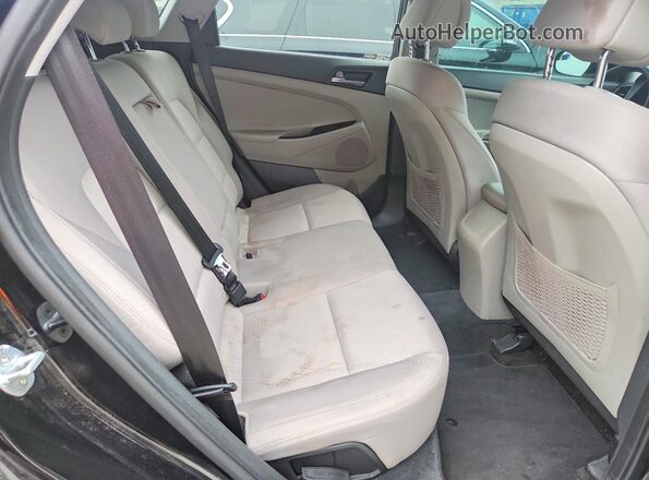 KM8J23A41GU043889 2016 HYUNDAI TUCSON Black Սալոնի հետևի տեսք