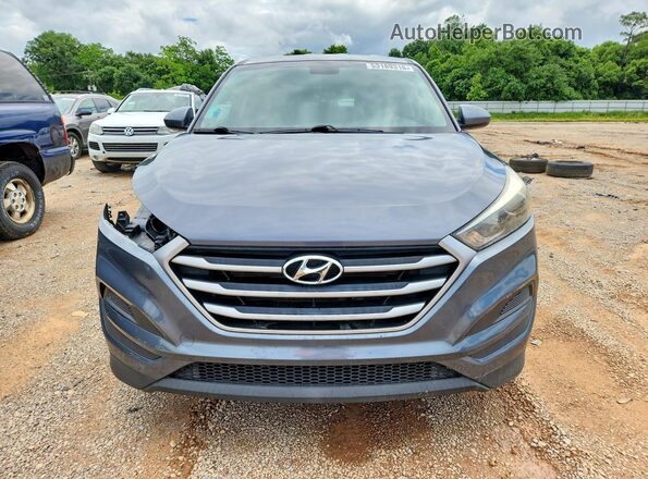 KM8J23A43JU635317 2018 HYUNDAI TUCSON Gray Front view