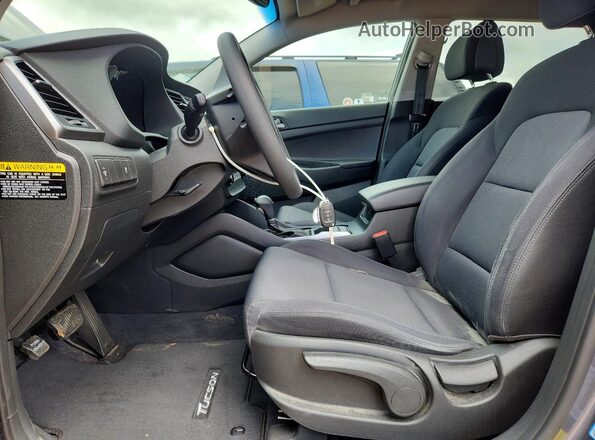 KM8J23A43JU635317 2018 HYUNDAI TUCSON Gray Front interior view