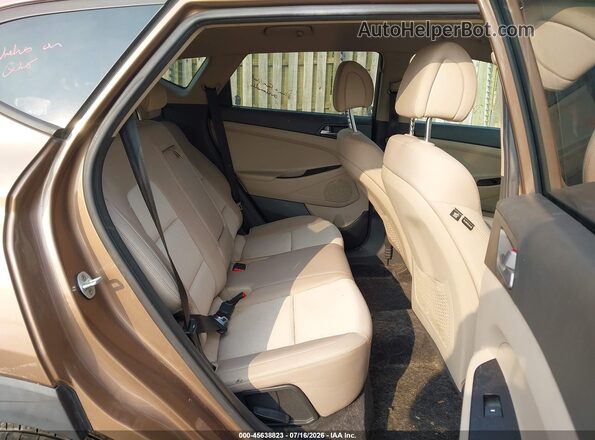 KM8J23A4XGU186176 2016 HYUNDAI TUCSON Brown VIN კოდის სტიკერის ხედი