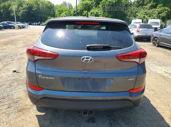 KM8J2CA40JU635324 2018 HYUNDAI TUCSON Gray Հետևի տեսք
