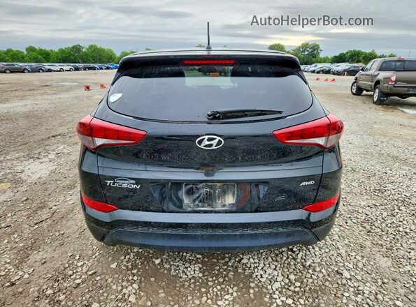 KM8J2CA41JU754404 2018 HYUNDAI TUCSON Black უკანა ხედი