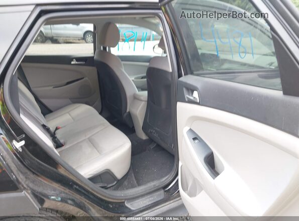 KM8J2CA41KU865083 2019 HYUNDAI TUCSON Black Widok naklejki z numerem VIN