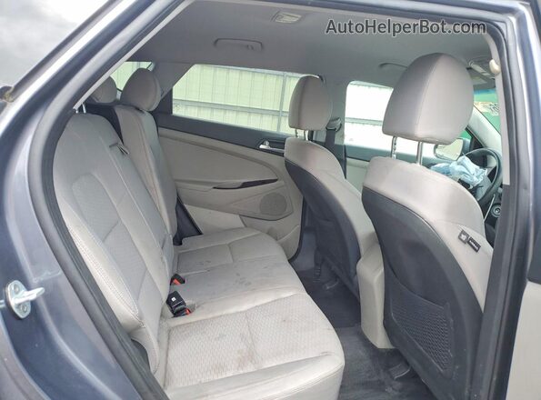 KM8J2CA41KU913620 2019 HYUNDAI TUCSON Серый Вид задней части салона