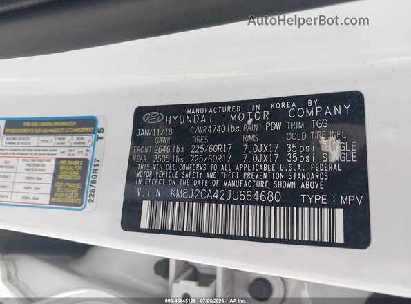 KM8J2CA42JU664680 2018 HYUNDAI TUCSON White Vista del compartimento del motor