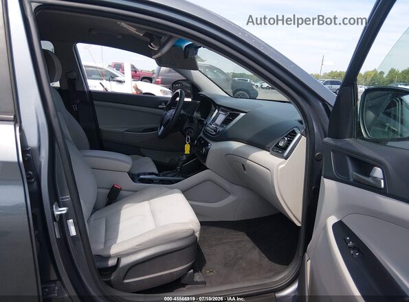 KM8J2CA44JU677897 2018 HYUNDAI TUCSON Gray წინა სალონის ხედი