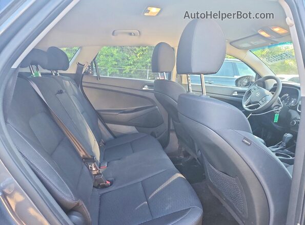 KM8J2CA46KU005342 2019 HYUNDAI TUCSON Charcoal Rear interior view
