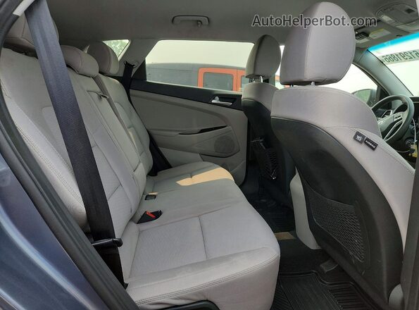 KM8J2CA46KU840194 2019 HYUNDAI TUCSON Gray Vista interior trasera