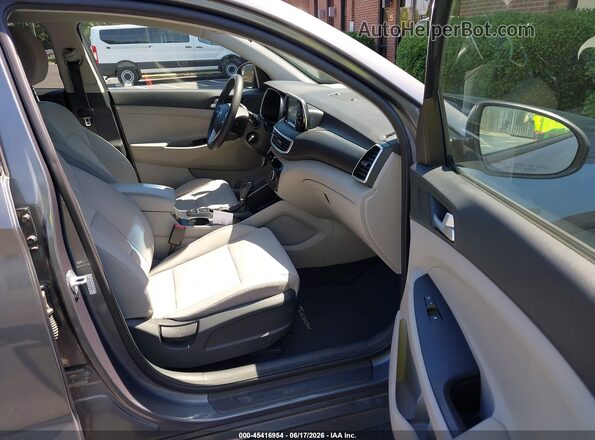 KM8J2CA46MU288943 2021 HYUNDAI TUCSON Gray წინა სალონის ხედი