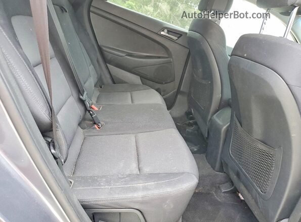KM8J2CA47JU694435 2018 HYUNDAI TUCSON Gray Vista interior trasera