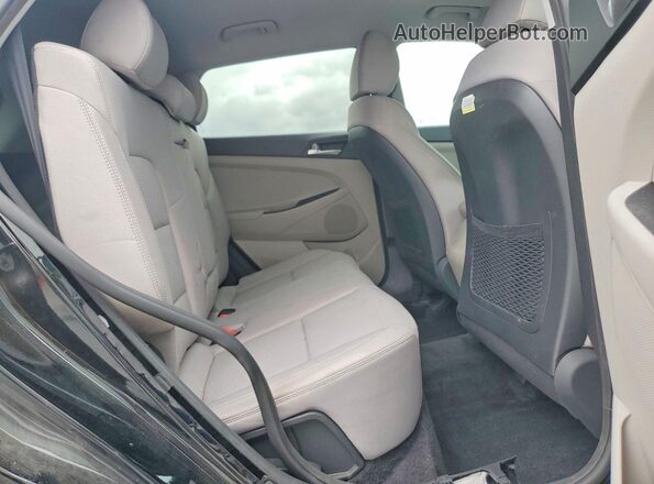 KM8J2CA47LU166218 2020 HYUNDAI TUCSON Black Widok wnętrza z tyłu