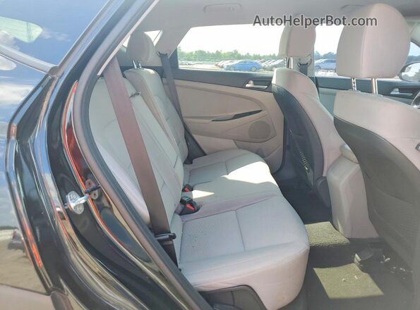 KM8J2CA47MU368221 2021 HYUNDAI TUCSON Black Rear interior view