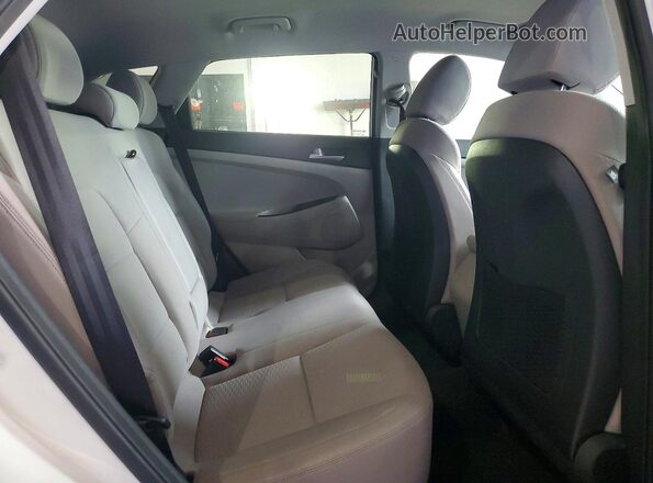 KM8J2CA48KU005651 2019 HYUNDAI TUCSON White Vista interior trasera