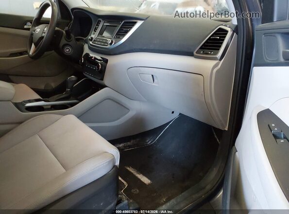 KM8J2CA49JU656740 2018 HYUNDAI TUCSON Gray წინა სალონის ხედი
