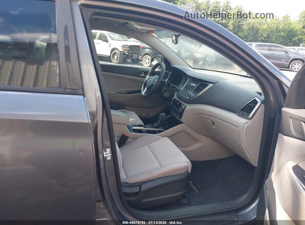 KM8J2CA4XJU656780 2018 HYUNDAI TUCSON Gray Vista interior delantera