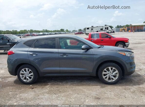 KM8J2CA4XKU039588 2019 HYUNDAI TUCSON Gray უკანა სალონის ხედი