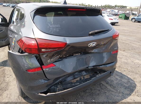 KM8J2CA4XKU951783 2019 HYUNDAI TUCSON Gray Front view