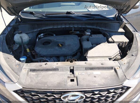 KM8J2CA4XKU988901 2019 HYUNDAI TUCSON Gray უკანა ხედი
