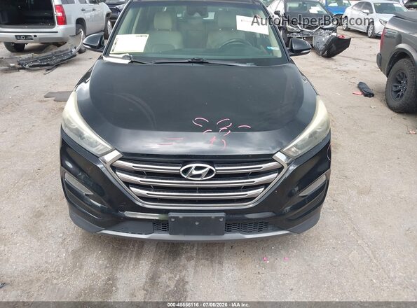 KM8J33A20GU204017 2016 HYUNDAI TUCSON Black Front view